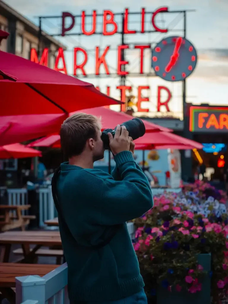Man-Taking-a-Photo-in-Pike-Place-Market-Public-Market-Seattle